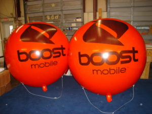 orange color advertising balloons with logo for sale in Austin